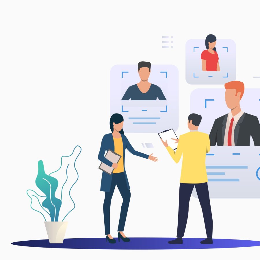 Recruiting professionals studying candidate profiles Recruiting professionals studying candidate profiles